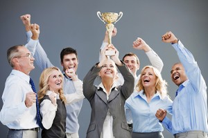 Successful businesspeople celebrating with the cup in hands. [url=http://www.istockphoto.com/search/lightbox/9786622][img]http://img543.imageshack.us/img543/9562/business.jpg[/img][/url]